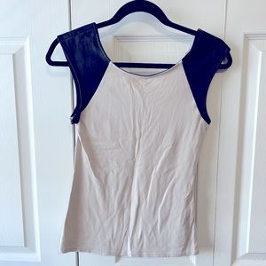 Express woman’s shirt with leather shoulder detail